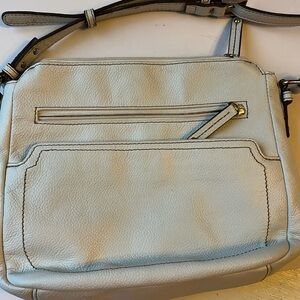 Tignanello crossbody bag . Pebbled leather winter white in color.